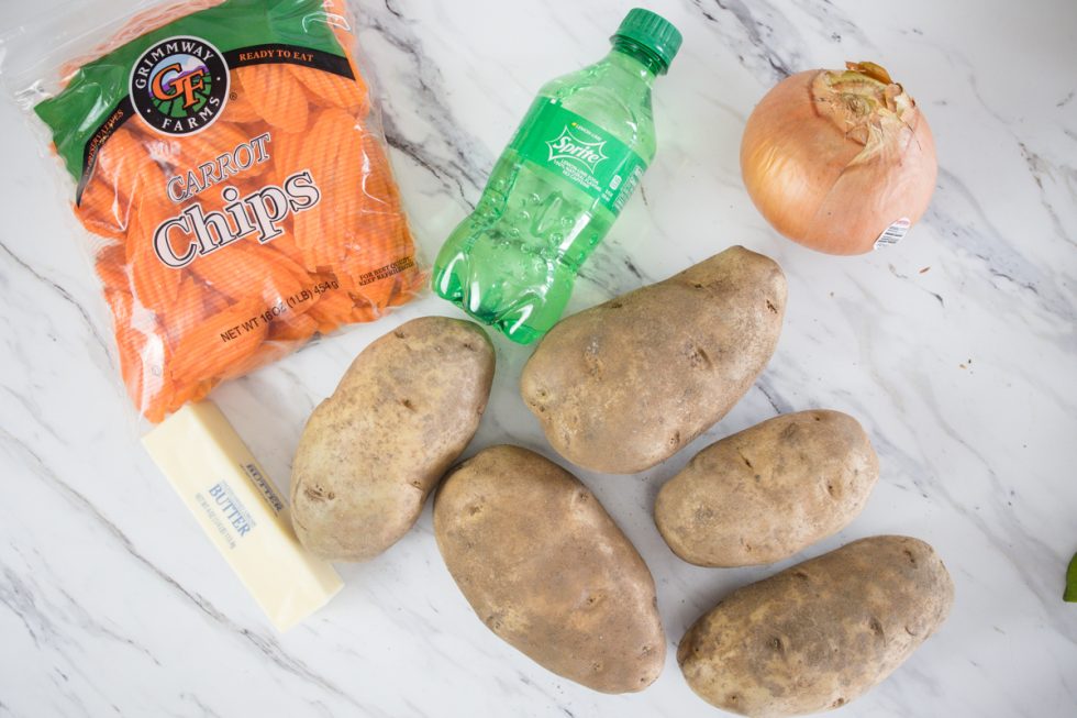 Dutch Oven Potatoes with Cheese - Devour Dinner