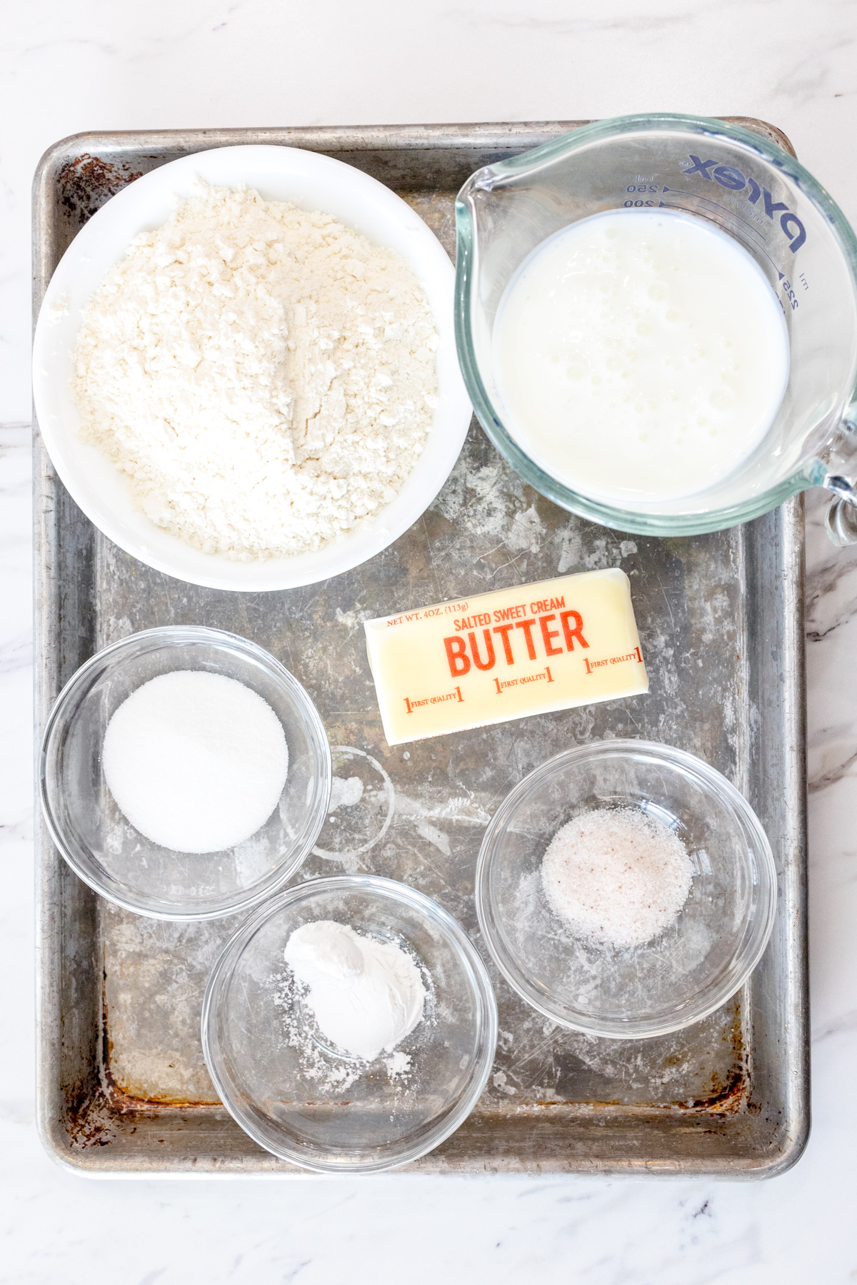 Top view of ingredients needed for butter swim biscuits.