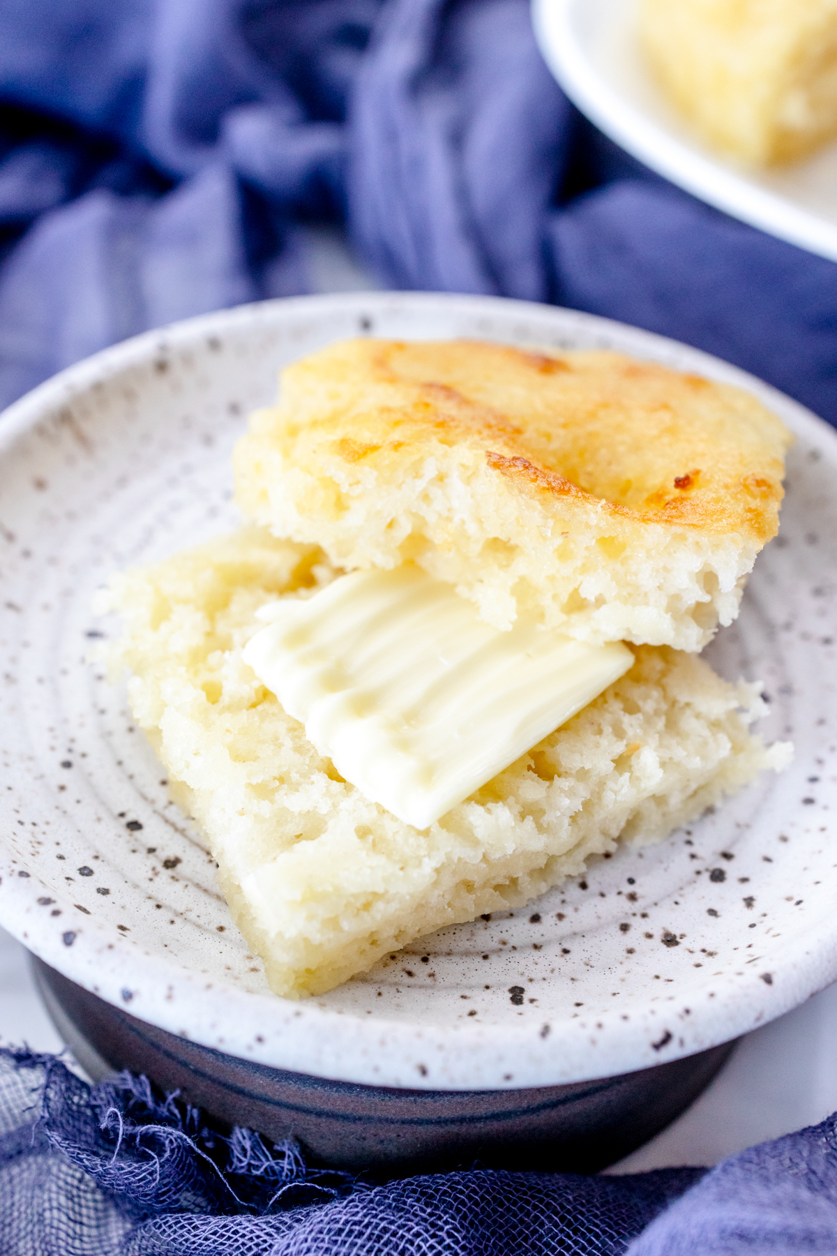 Medium-close shot of swim biscuits on white plates.