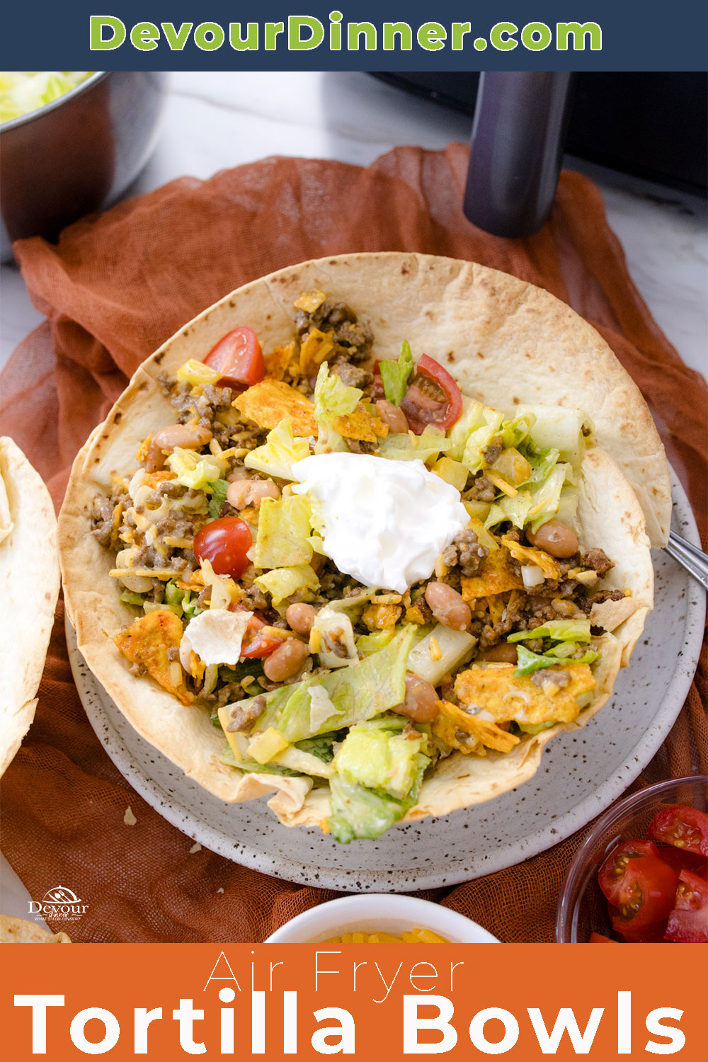 This Air Fryer Tortilla Bowl Recipe makes golden-brown, crispy bowls that are perfect for holding all your favorite taco salad ingredients! These edible bowls are not only easy to make, but it's also a healthier option that will elevate your next taco night with a fun and delicious twist!