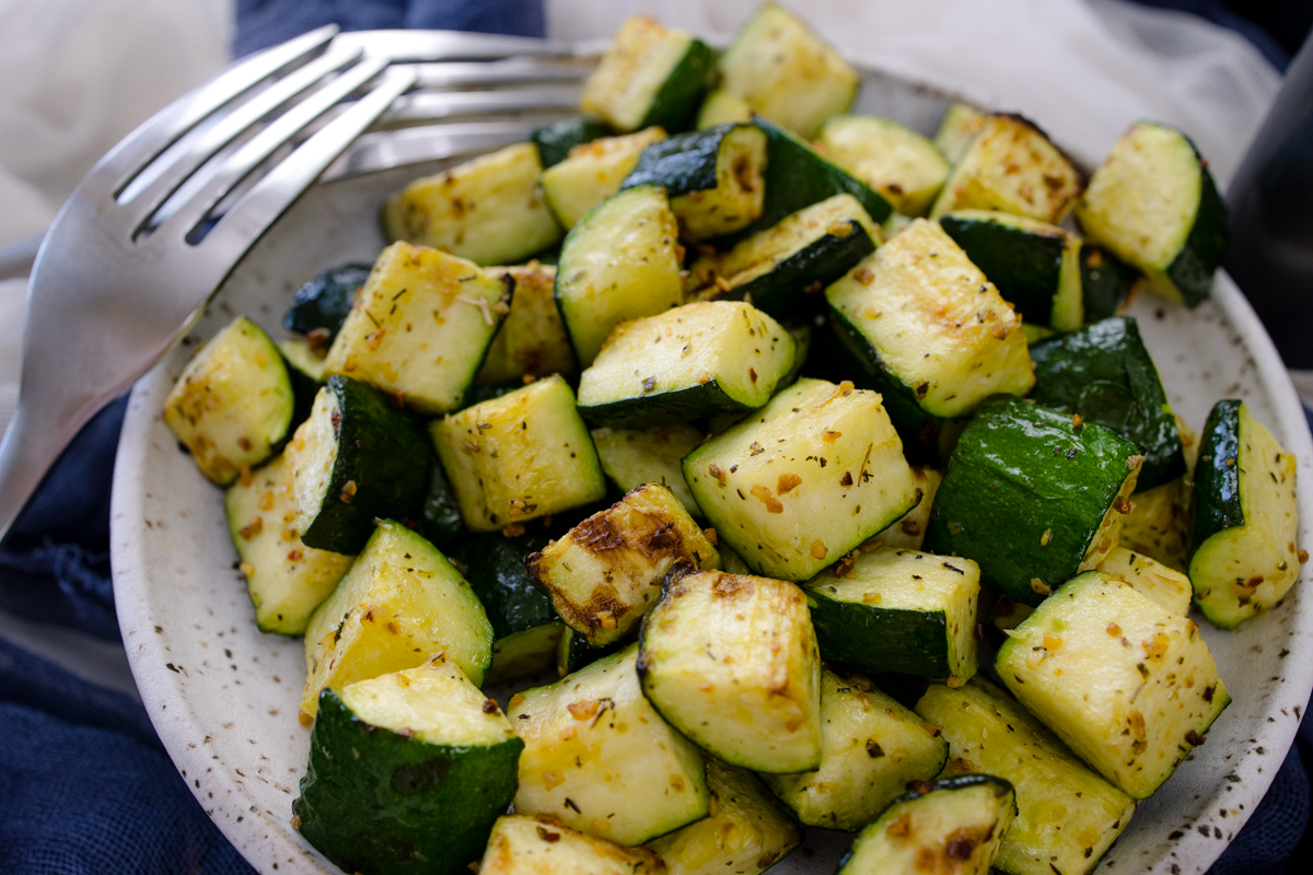 A plate full of air fryer zucchini.