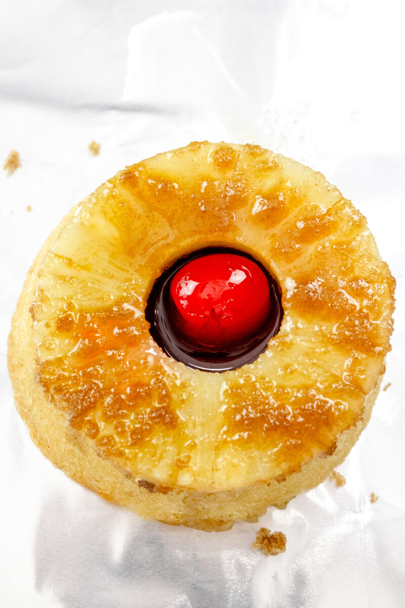 Top pineapple ring with cherry